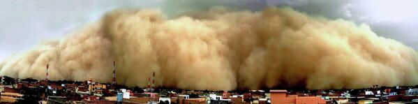 طوفان شن، شهرهای مختلف جهان را  به کام خود می کشاند. منظره حمله طوفان شن به ایالت راجستان هند. - اسپوتنیک ایران  