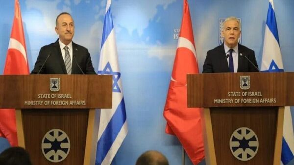 مولود چاووش اوغلو و یائیر لاپید، وزیران خارجه  ترکیه و اسرائیل   - اسپوتنیک ایران  