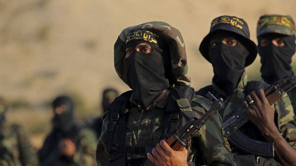رزمندگان جهاد اسلامی فلسطین در رزمایش نظامی در نوار غزه - اسپوتنیک ایران  