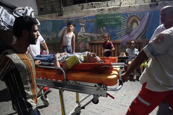 وزارت بهداشت فلسطین صبح امروز اعلام کرد که در حملات هوایی اسرائیل به نوار غزه 29 تن از جمله 6 کودک و 4 زن به شهادت رسیده و 253 فلسطینی دیگر مجروح شده‌اند. - اسپوتنیک ایران  