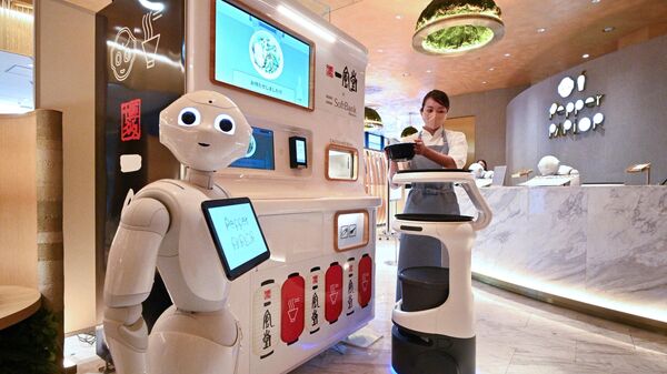 Роботы во время презентации Japan's SoftBank Robotics в Токио  - اسپوتنیک ایران  