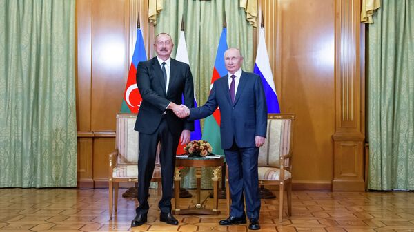 Президент Азербайджана Ильхам Алиев и президент РФ Владимир Путин во время встречи - اسپوتنیک ایران  