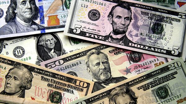 کارشناس: روند دلار زدایی در جهان سرعت پیدا کرده است - اسپوتنیک ایران  