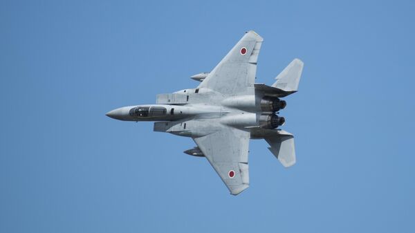 Истребитель F-15J Eagle японских военно-воздушных сил самообороны. Архивное фото - اسپوتنیک ایران  