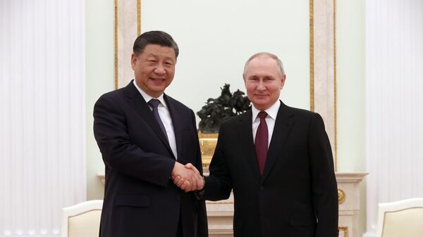 Председатель КНР Си Цзиньпин и президент России Владимир Путин на встрече в Кремле - اسپوتنیک ایران  