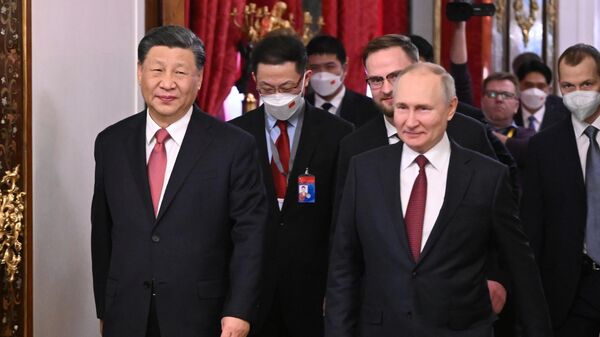 Президент РФ Владимир Путин и председатель КНР Си Цзиньпин во время встречи в Москве - اسپوتنیک ایران  