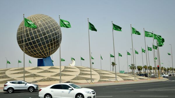 Флаги Саудовской Аравии на одной из улиц города Джидда - اسپوتنیک ایران  