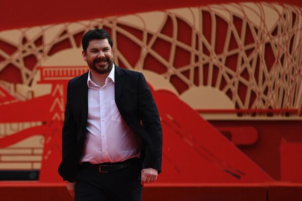 فابین گورگرت کارگردان فرانسوی در مراسم افتتاحیه سیزدهمین جشنواره بین المللی فیلم پکن روی فرش قرمز. - اسپوتنیک ایران  