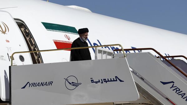 Президент Ирана Эбрагим Раиси прибывает в Международный аэропорт Дамаска, Сирия - اسپوتنیک ایران  