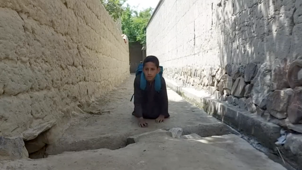 عبدالله کودک ۸ ساله افغانستانی - اسپوتنیک ایران  