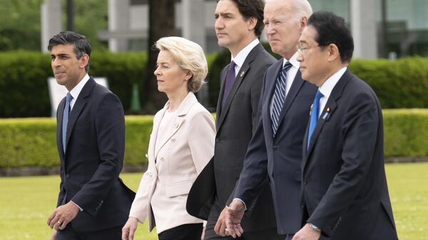 رهبران گروه 7 به بنای یادبود قربانیان بمباران اتمی  هیروشیما شاخه های گل نثار کردند  - اسپوتنیک ایران  