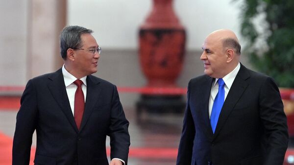میخائیل میشوستین، نخست وزیر فدراسیون روسیه و لی کیانگ، نخست وزیر  جمهوری خلق چین در دیدار در پکن - اسپوتنیک ایران  
