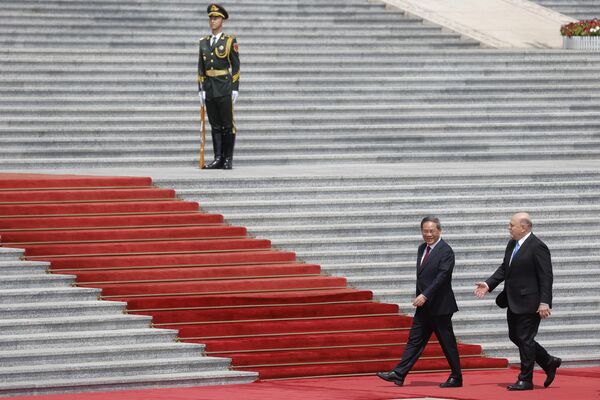 میخائیل میشوستین، نخست وزیر روسیه و لی کیانگ، نخست وزیر چین در پکن - اسپوتنیک ایران  