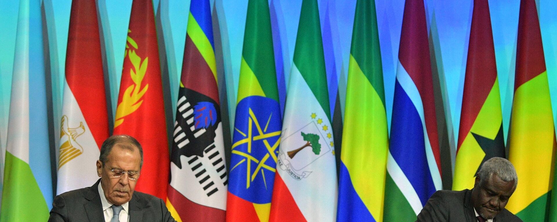 Russian Foreign Minister Sergey Lavrov and Chairman of the African Union Commission Moussa Faki Mahamat (second from right) at the signing ceremony of the Memorandum between the Russian Federation and the African Union on the foundations of relations and cooperation during the Russia-Africa Summit in 2019.  - اسپوتنیک ایران  , 1920, 21.07.2023