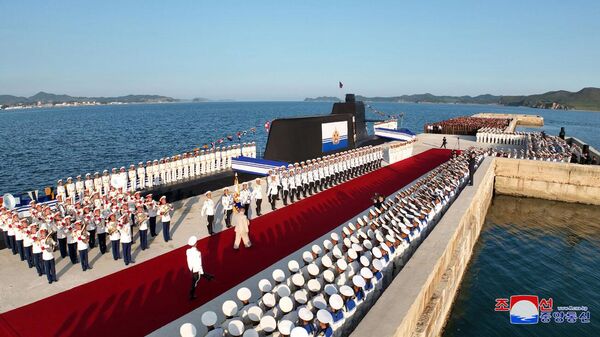 مراسم هدایت زیردریایی اتمی کره شمالی به آب  - اسپوتنیک ایران  