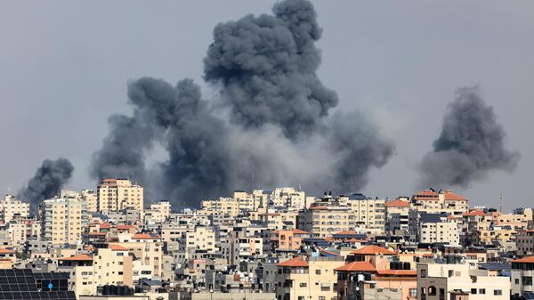 Дым над Газой после ответных ударов Израиля 7 октября 2023 - اسپوتنیک ایران  