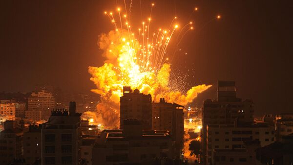 Обстрел зданий в палестинском городе Газа - اسپوتنیک ایران  