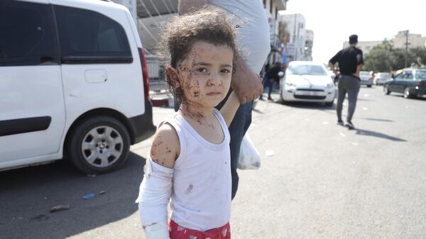 Ребенок, пострадавший в результате ракетных ударов ВС Израиля по Газе - اسپوتنیک ایران  
