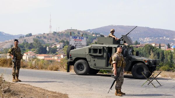 Члены ливанской армии патрулируют на ливанской стороне ливано-израильской границы в южной деревне Кфар-Кила - اسپوتنیک ایران  
