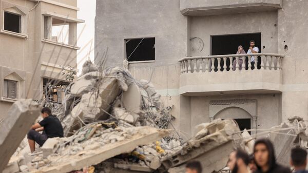 Последствия израильской бомбардировки в Хан-Юнисе на юге сектора Газа - اسپوتنیک ایران  