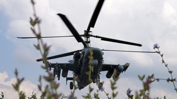 Ударный вертолет Ка-52 возвращается после выполнения боевой задачи в зоне проведения специальной военной операции - اسپوتنیک ایران  