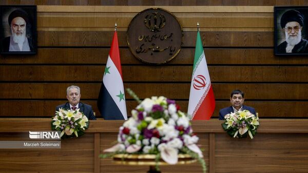 
محمد مخبر، معاون اول رئیس‌جمهور ایران و حسین عرنوس، نخست وزیر سوریه  - اسپوتنیک ایران  