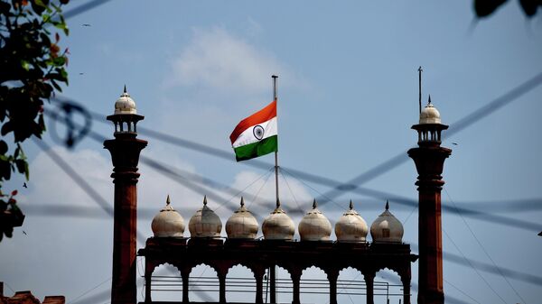 The Indian flag flies at half-mast at the historic Red Fort following Thursday’s death of Britain's Queen Elizabeth II in New Delhi, India, Sunday, Sept.11, 2022. - اسپوتنیک ایران  