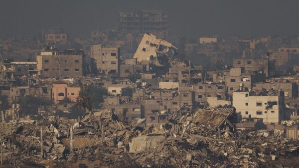 Разрушенные здания в результате израильского авиаудара на севере сектора Газа - اسپوتنیک ایران  