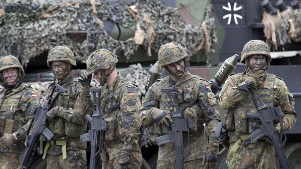 Солдаты немецкого Бундесвера во время военных учений НАТО в Вильнюсе  - اسپوتنیک ایران  