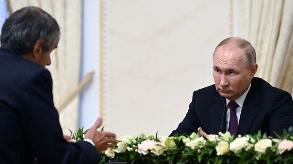 Президент РФ Владимир Путин и генеральный директор МАГАТЭ Рафаэль Гросси во время встречи - اسپوتنیک ایران  