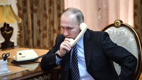 Президент России Владимир Путин во время телефонного разговора - اسپوتنیک ایران  