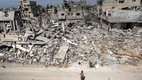 ساختمان های ویران شده در شهر خان یونس نوار غزه - اسپوتنیک ایران  