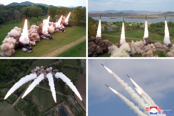 اولین تمرینات تاکتیکی شبیه سازی ضدحمله هسته ای کره شمالی با استفاده از سامانه های موشک پرتاب چندگانه &quot;فوق العاده بزرگ&quot;. - اسپوتنیک ایران  