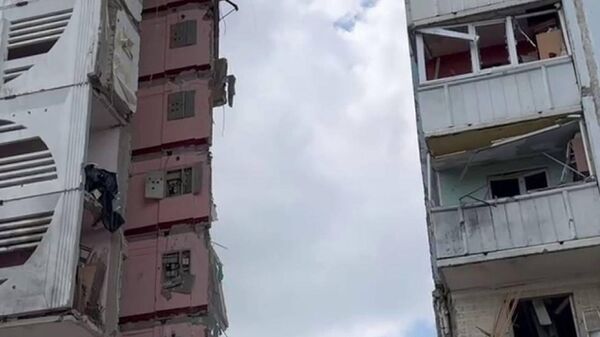 گلوله باران یک ساختمان مسکونی توسط نیروهای اوکراین در بلگورود - اسپوتنیک ایران  