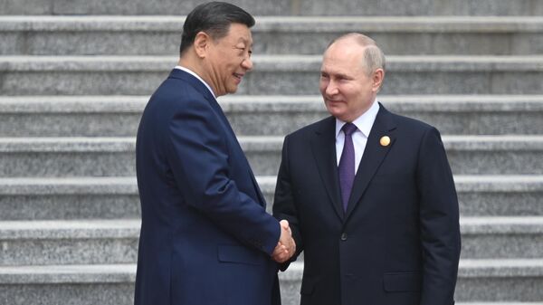 ولادیمیر پوتین، رئیس جمهور روسیه و شی جین پینگ، رئیس جمهور چین  - اسپوتنیک ایران  