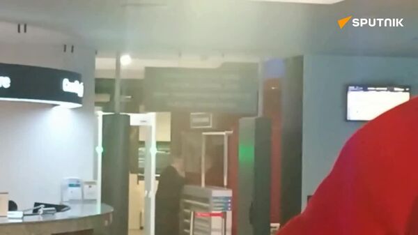 اسقف مارکل در بخش کنترل مرزی و گمرکی در فرودگاه بین المللی کیشیناو - اسپوتنیک ایران  