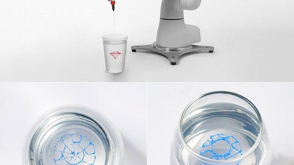 در ژاپن، رباتی برای نقاشی در نوشیدنی‌ها ساخته شده است - اسپوتنیک ایران  