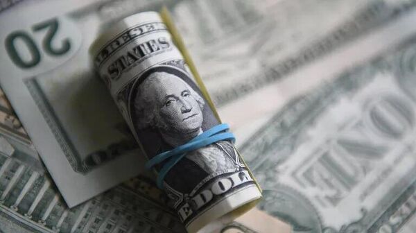 استفاده از ارزهای ملی، سلطه دلار را تضعیف می‌کند - اسپوتنیک ایران  