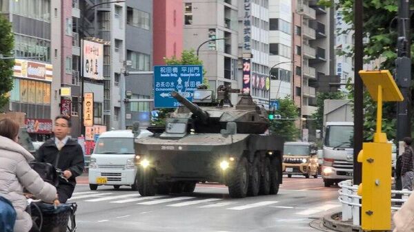 در 24 اکتبر، شاهدان عینی از حضور خودروهای جنگی نوع 16 نیروهای دفاع از خود ژاپن در مرکز توکیو خبر دادند - اسپوتنیک ایران  