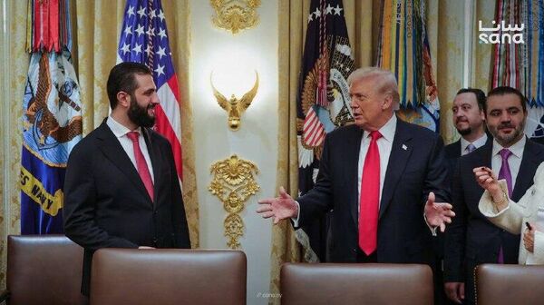 تصاویری از دیدار دونالد ترامپ، رئیس جمهور آمریکا، با احمد الشرع، رئیس جمهور سوریه در کاخ سفید - اسپوتنیک ایران  