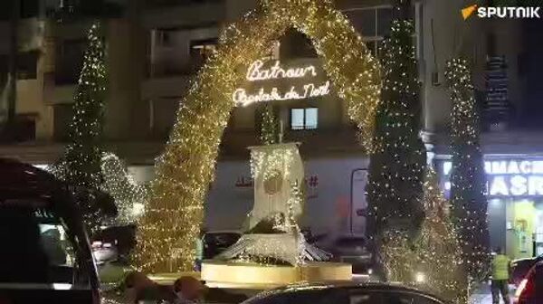 بترون لبنان کریسمس را جشن می‌گیرد / شادی، لبنانی‌ها را پس از دورانی دشوار متحد می‌کند - اسپوتنیک ایران  