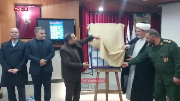 اهدای شناسنامه به خانواده 13 شهید «جنگ 12 روزه» زنجان - اسپوتنیک ایران  