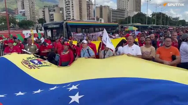 کارگران حمل و نقل کاراکاس با درخواست آزادی مادورو به خیابان‌ها آمدند - اسپوتنیک ایران  