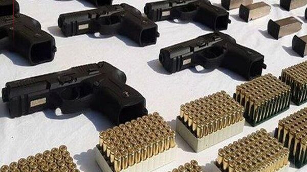 کشف یک هزار فشنگ کلت کمری در آبادان ایران - اسپوتنیک ایران  