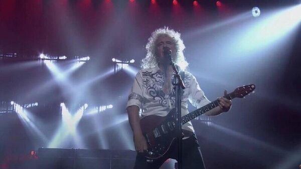 برایان می، گیتاریست گروه کوئین، گفت که این گروه دیگر سفر هنری به ایالات متحده نخواهد داشت و این کشور را مکانی خطرناک خواند - اسپوتنیک ایران  