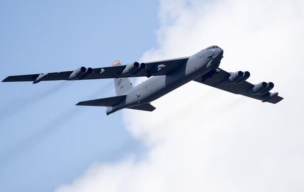 A US Air Force B-52 bomber flies over Training Range in Pabrade during a military exercise 'Iron Wolf 2016' some 60km.(38 miles) north of the capital Vilnius, Lithuania, Thursday, June 16, 2016. (AP Photo/Mindaugas Kulbis) - اسپوتنیک ایران  