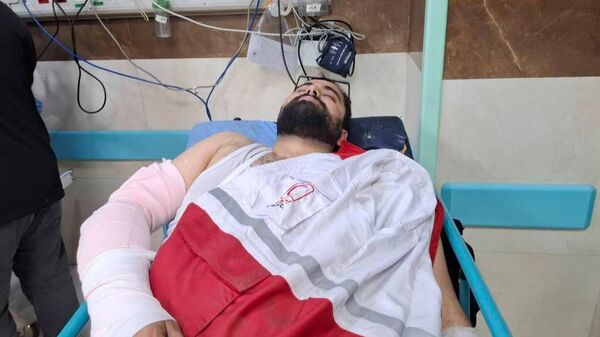  امدادگر داوطلب ایرانی  که حین امدادرسانی مجروح شد اما در میدان ماند - اسپوتنیک ایران  