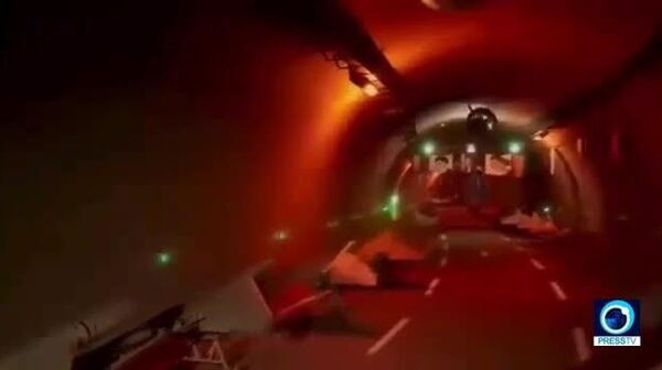 سپاه پاسداران بخشی از زرادخانه پهپادی خود در یک تونل را به نمایش گذاشت - اسپوتنیک ایران  