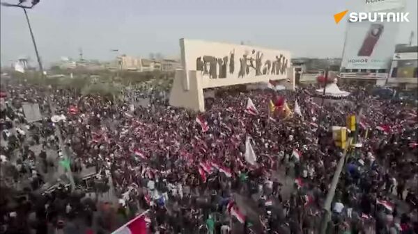 عراقی‌ها در کنار ایران در برابر حملات آمریکا و اسرائیل می‌ایستند - اسپوتنیک ایران  