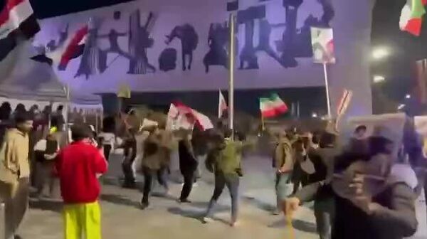 میدان التحریر بغداد پس از اعلام عقب‌نشینی ترامپ در برابر شروط ایران - اسپوتنیک ایران  